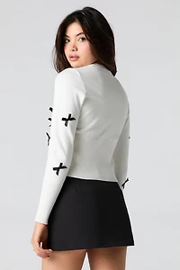 Cardigan boutonné avec boucle en 3D