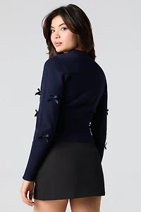 Cardigan boutonné avec boucle en 3D