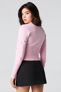 Cardigan boutonné avec boucle en 3D