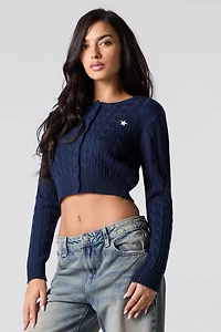 Cardigan écourté en tricot mailles torsadées et broderie