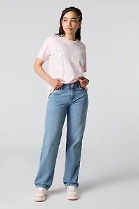 Jean mi-taille à jambe droite