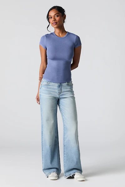 Jean extensible à jambe large délavé pâle