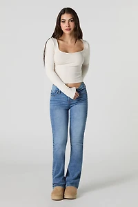 Jean extensible taille basse à jambe évasée