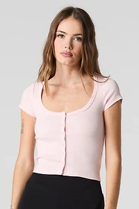 Haut côtelé boutonné à encolure ronde