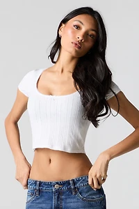 Haut écourté à encolure ronde en tricot pointelle