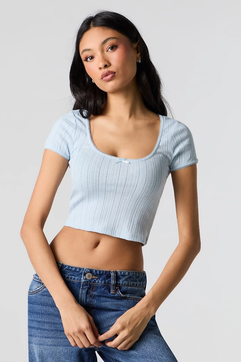 Haut écourté à encolure ronde en tricot pointelle
