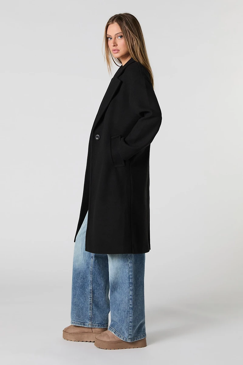 Manteau longueur midi à un bouton