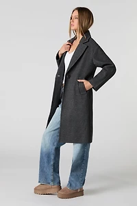 Manteau longueur midi à un bouton