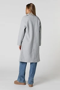 Manteau longueur midi à un bouton