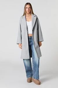Manteau longueur midi à un bouton
