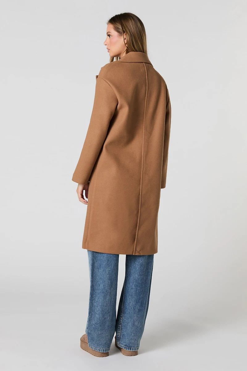 Manteau longueur midi à un bouton