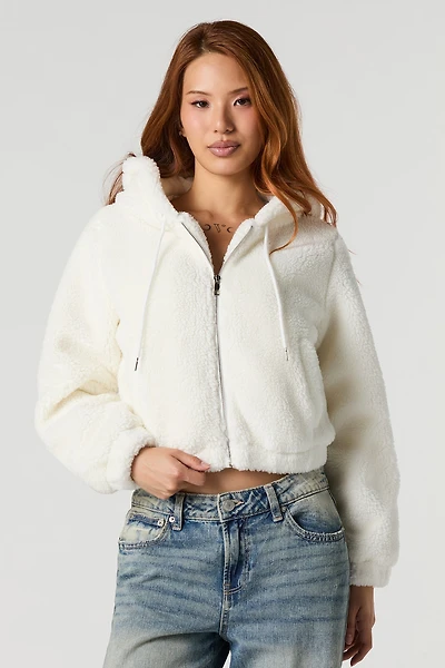 Blouson avec capuchon en sherpa