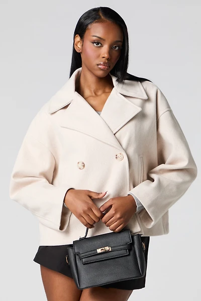 Manteau court à double boutonnage