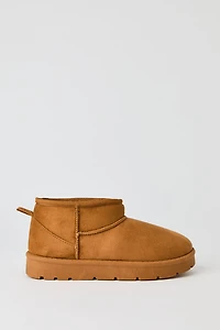 Bottes aux chevilles en similisuède