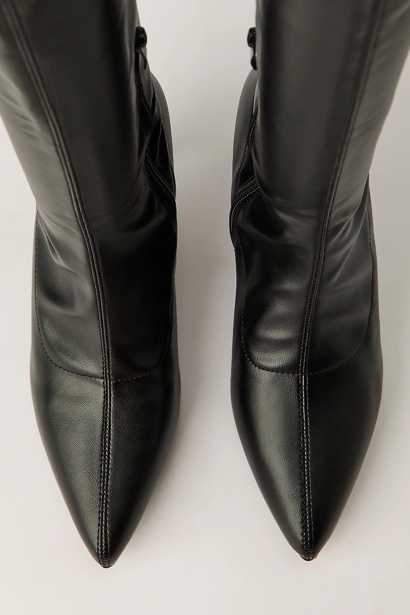 Bottes aux mollets à talon bottine