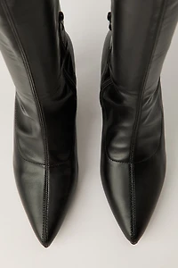 Bottes aux mollets à talon bottine