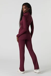 Pantalon à jambe évasée et taille repliée Active