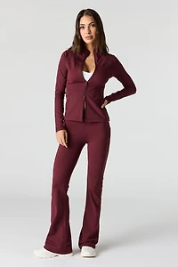 Legging U/A à jambe évasée avec poches latérales