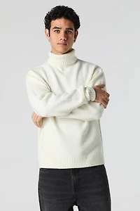 Chandail à col roulé en tricot mousseux
