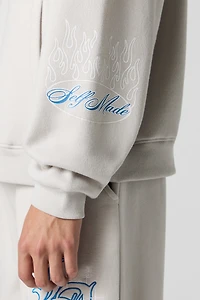 Haut à capuchon en molleton broderie LA