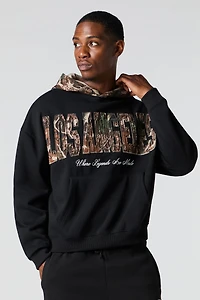 Haut carré à capuchon en molleton avec motif camouflage
