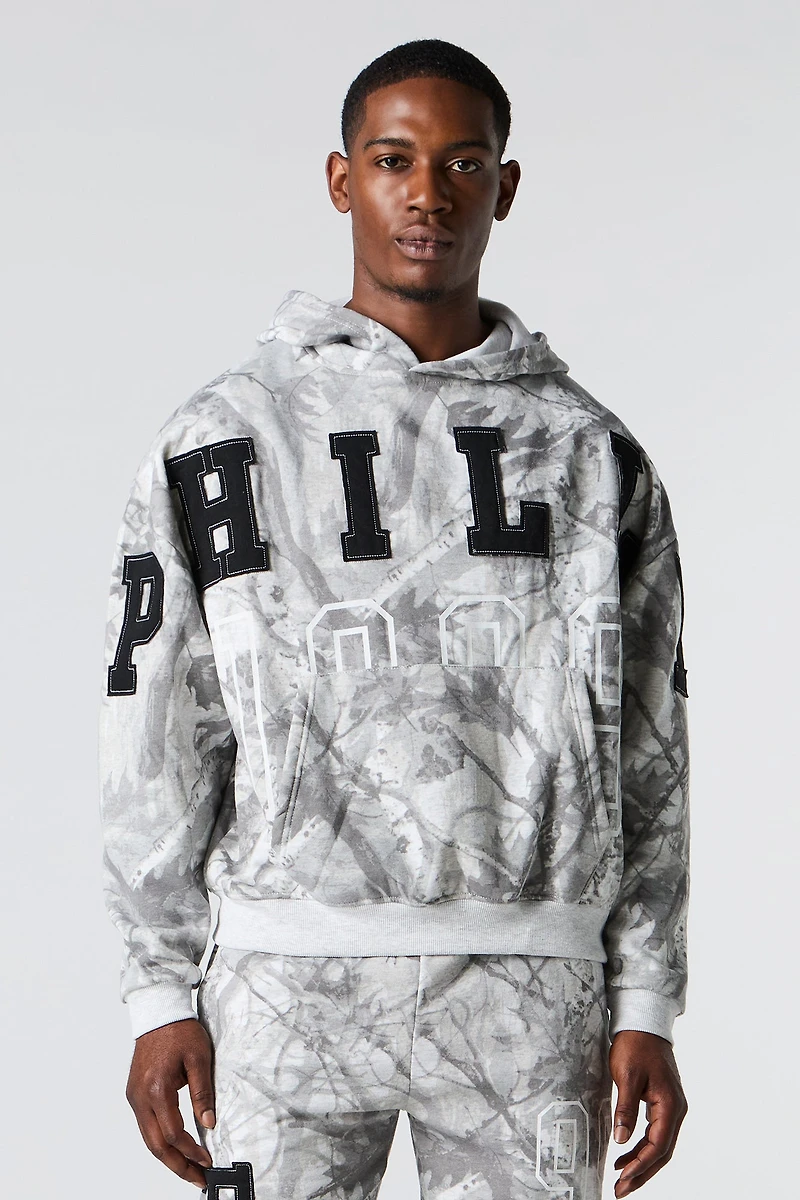 Haut carré à capuchon en molleton avec motif camouflage