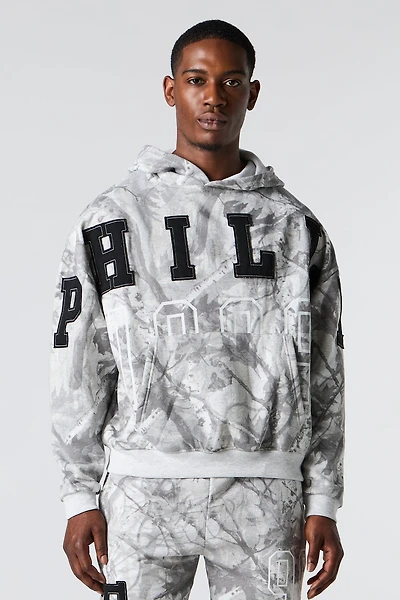 Haut carré à capuchon en molleton avec motif camouflage