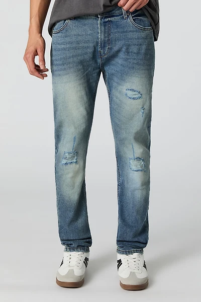 Jean mince extensible à effet d'usure lavé moyen