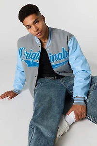 Blouson de style universitaire en molleton avec manches similicuir
