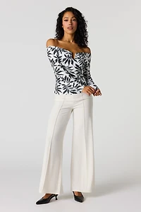 Pantalon à jambe large et taille haute avec surpiqûres