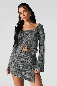 Minijupe asymétrique à taille coulissante