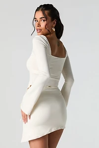 Minijupe asymétrique à taille coulissante