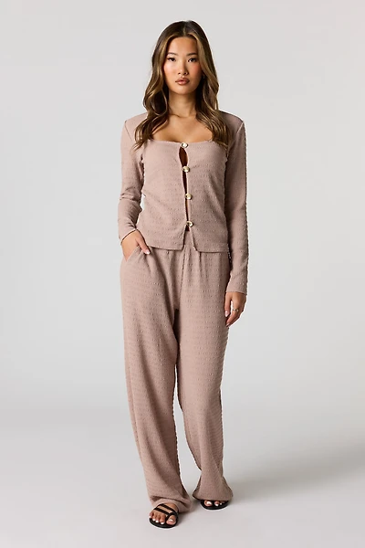 Pantalon à jambe large texturé