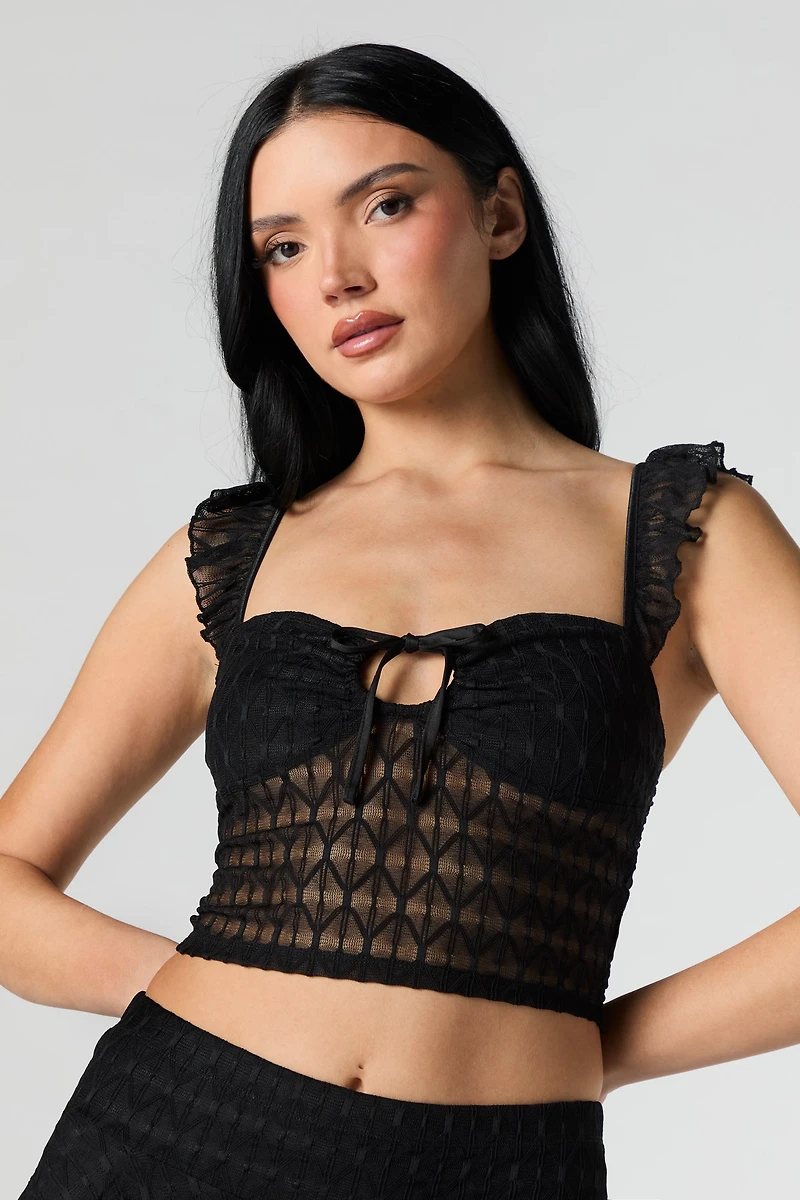 Bustier en dentelle avec bretelles volantées