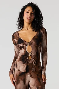 Haut ouvert avec découpes et accent métallisé