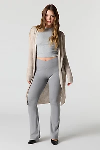 Cardigan long en tricot ajouré