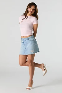 T-shirt ultracourt en tricot de pointelle avec rosettes