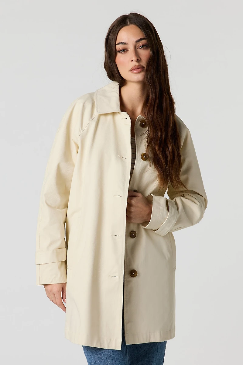 Blouson écourté boutonné