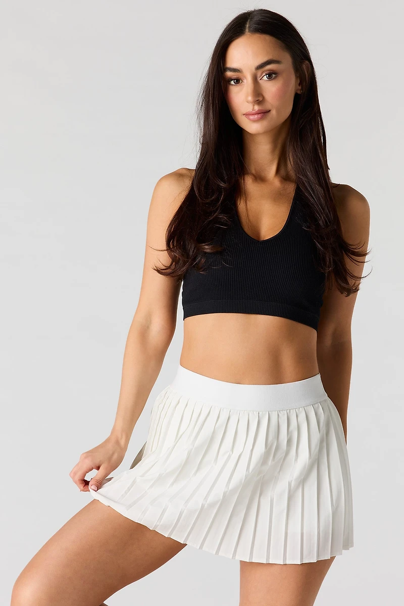 Jupe-short Active plissée avec poches latérales