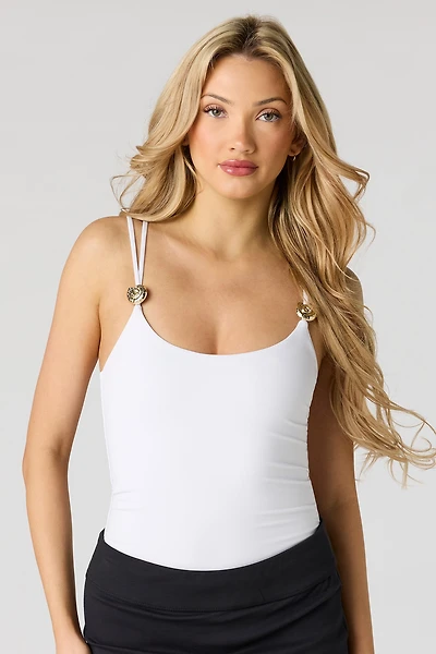 Maillot profilé avec détails métallisés et encolure dégagée