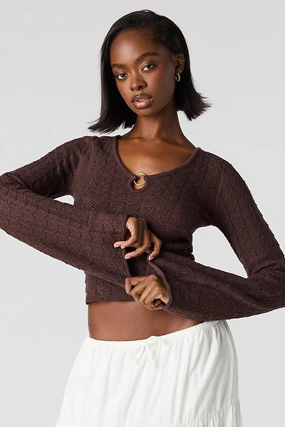 Haut crocheté à manches cloche avec anneau en O