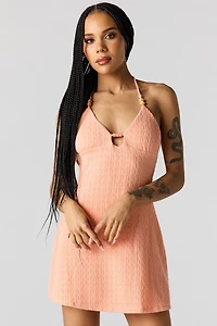 Minirobe bain-de-soleil en tricot avec billes
