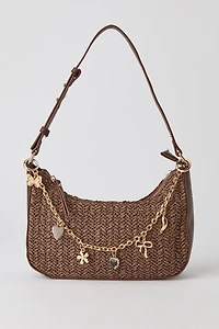 Sac à bandoulière en raphia avec breloque