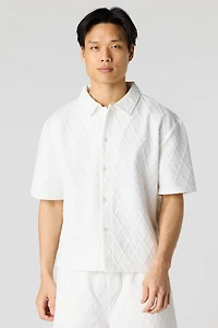 Haut boutonné texturé avec col