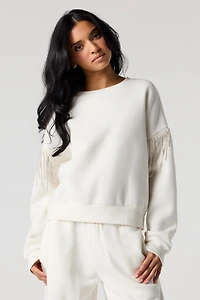 Chandail en molleton à manches ornées de pierres du Rhin