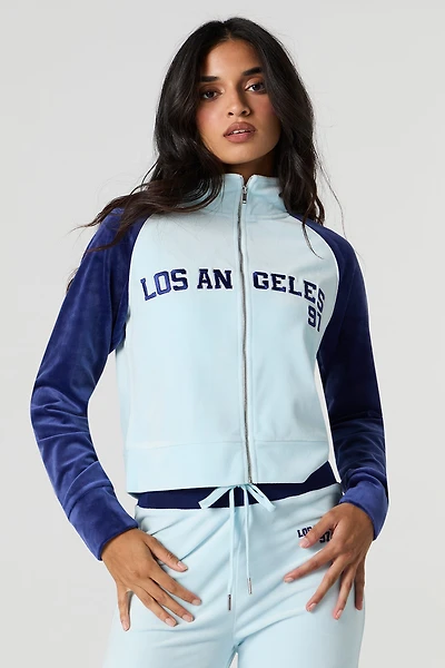 Chandail en velours avec motif brodé et fermeture à glissière