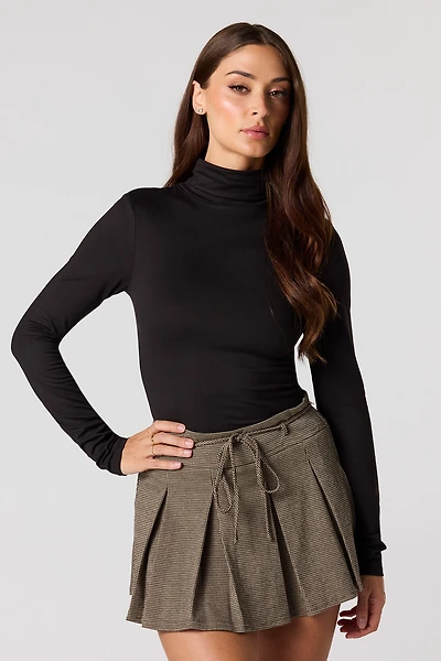 Minijupe-short plissée en tricot jacquard