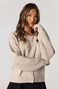 Cardigan en tricot torsadé pelucheux