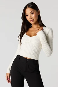 Chandail en tricot torsadé à décolleté coeur