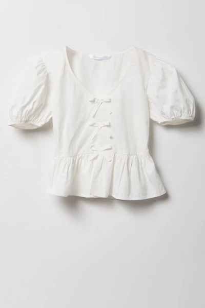 Haut à manches bouffantes courtes
